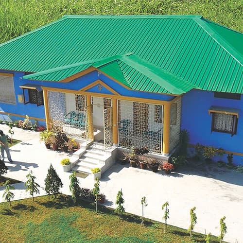 Houses roofed with green DURASHINE roof and wall sheets