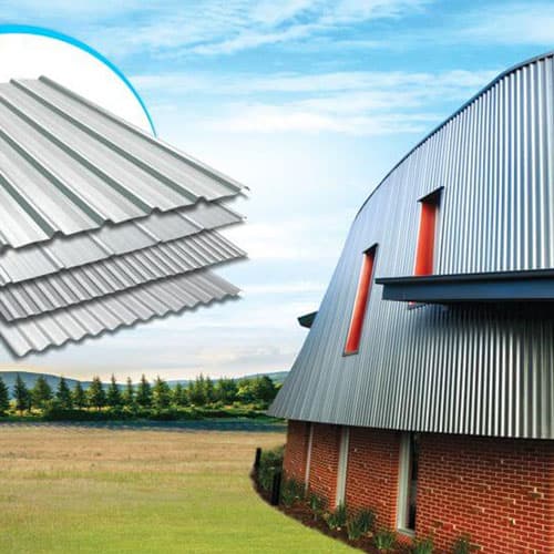 A curved-roof building clad in Satin Silver cool roof and wall sheets